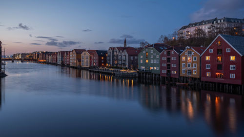 Illuminated buildings in water