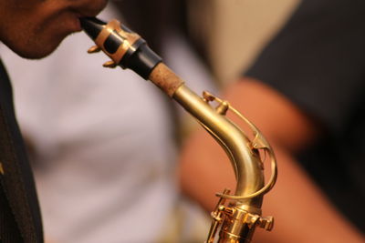 Close-up of man playing trumpet