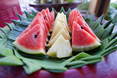 Close-up of fruits in plate on table