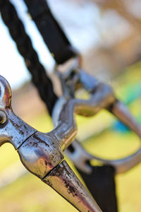 Close-up of metallic object against blurred background