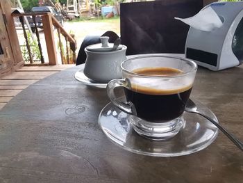 Close-up of coffee cup on table