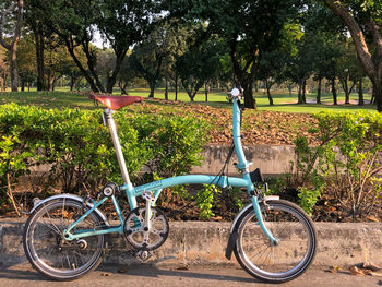 Bicycle parked on field