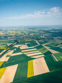 Aerial view of cityscape against sky