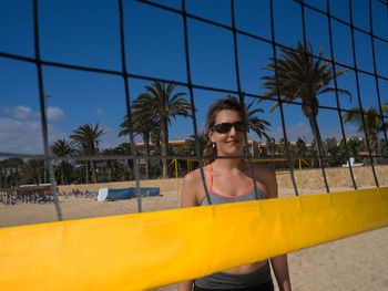 Portrait of young woman in swimming pool