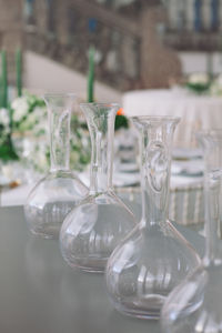 Close-up of empty glasses on table