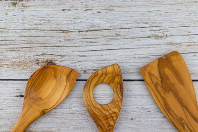 Directly above shot of wooden spoons on table