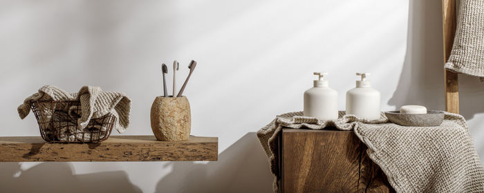 Row of bottles on table at home