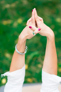 Cropped hand of woman holding hands