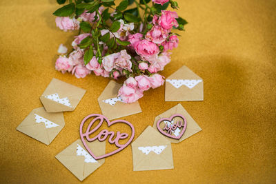 High angle view of pink flower on table