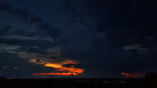 Scenic view of dramatic sky during sunset
