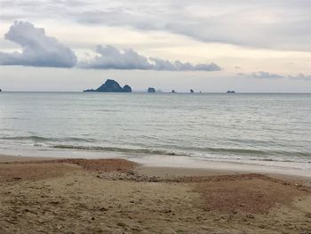 Scenic view of beach against sky