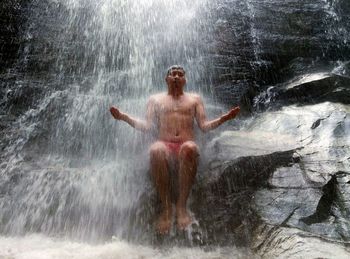 Young man in water