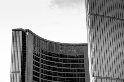 Low angle view of modern buildings against sky