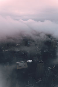 High angle view of buildings in city during rainy season