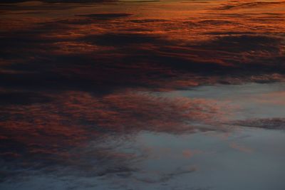 Scenic view of landscape against cloudy sky