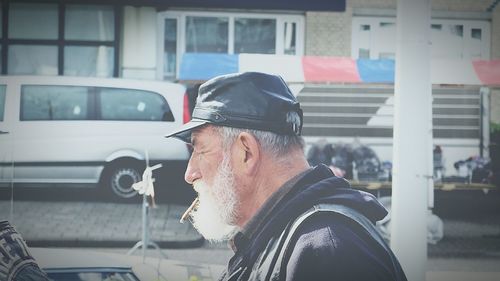 Side view of man wearing sunglasses