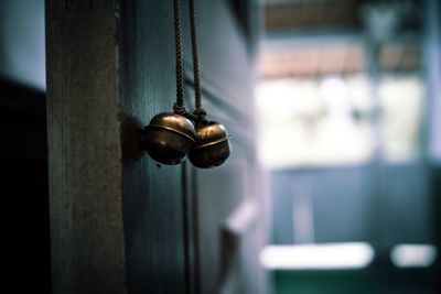 Close-up of chain hanging on metal door