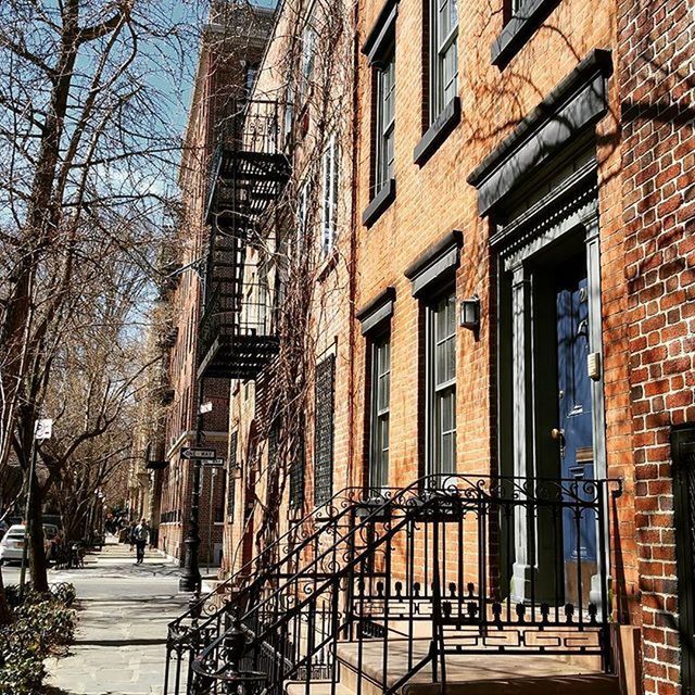 building exterior, architecture, built structure, city, residential building, window, tree, residential structure, building, street, house, sidewalk, day, outdoors, the way forward, bare tree, facade, shadow, railing, sunlight