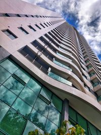 Low angle view of modern building against sky