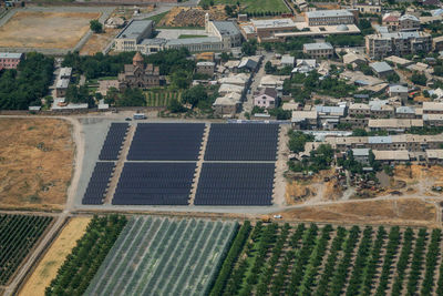 Aerial view of solar panel in agricultural field