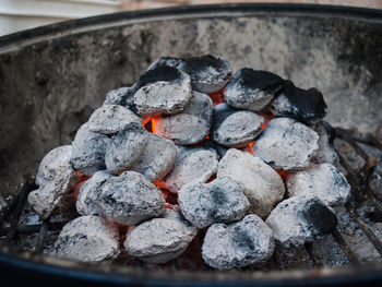 Close-up of coal in barbecue grill