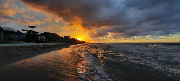 Scenic view of sea against sky during sunset