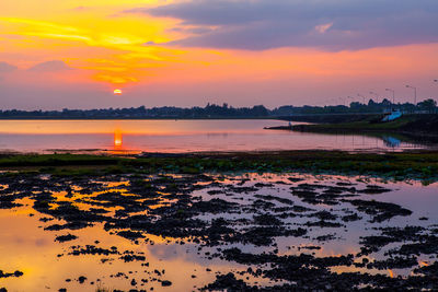 Scenic view of sea against sky during sunset