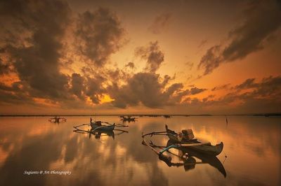 Scenic view of sunset over sea