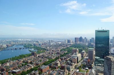 Cityscape and john hancock tower against sky