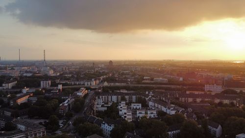 High angle view of townscape against sky at sunset