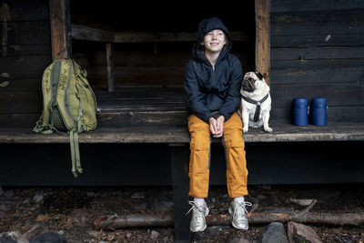 Full length portrait of man standing outdoors