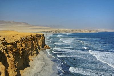 Scenic view of sea against sky during winter