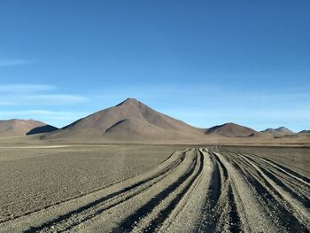 Scenic view of desert against sky