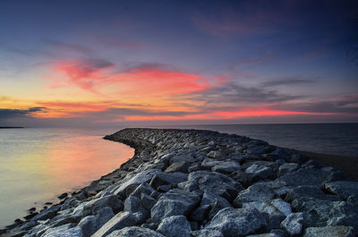 Scenic view of sea against sky during sunset