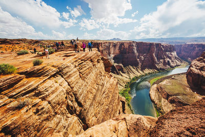 Panoramic view of landscape against cloudy sky