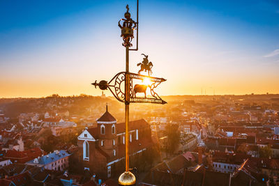 High angle view of townscape against sky at sunset