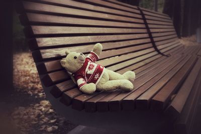 View of stuffed toy on bench