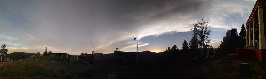 Panoramic view of city against sky during sunset