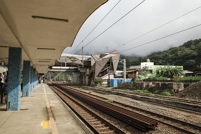 Railroad station platform against sky