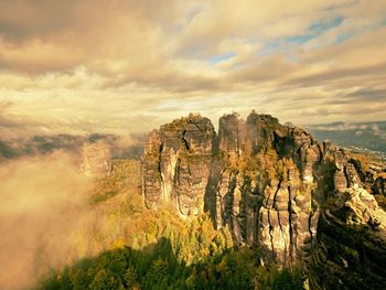 Scenic view of landscape against sky during sunset