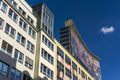 Low angle view of modern building against sky