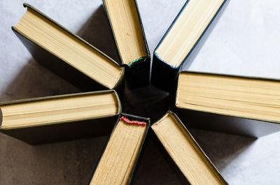 High angle view of pencils on wooden table