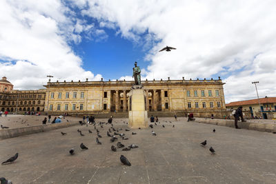 View of historic building against cloudy sky