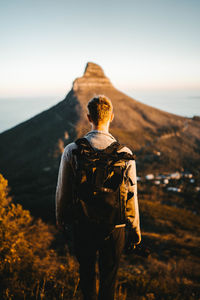 Rear view of man looking at mountain