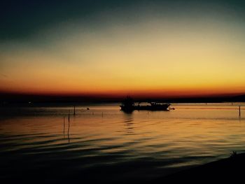 Scenic view of sea at sunset