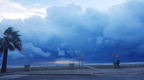 Scenic view of sea against blue sky