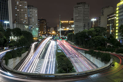 High angle view of light trails on road at night