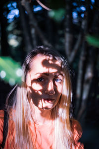 Portrait of woman in forest