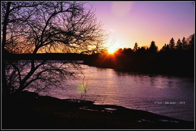 Sun shining over lake