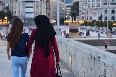 Woman standing in city